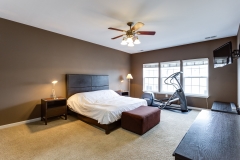 Master bedroom: the elliptical machine is ready for you.